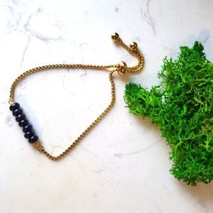 Handmade stainless steel bracelet gold tone and blue gemstones